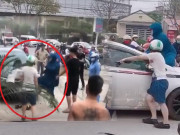 Tin tức - Người phụ nữ nhảy lên nắp capo đập kính xe, đánh ghen giữa phố, đạp tiểu tam ngã dúi dụi