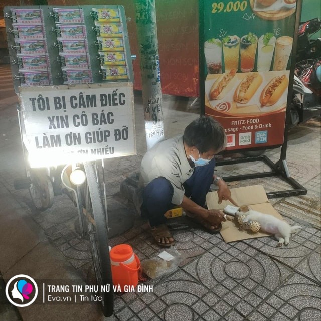 Ông lão câm điếc bán vé số từng từ chối 70 triệu tiền từ thiện và chú chó hot mạng - 1