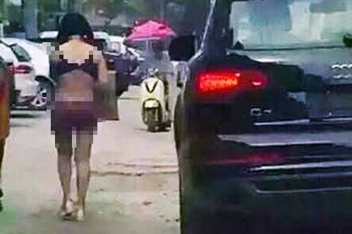 Woman in underwear walking in the middle of the street, sad to know the reason behind it - 1