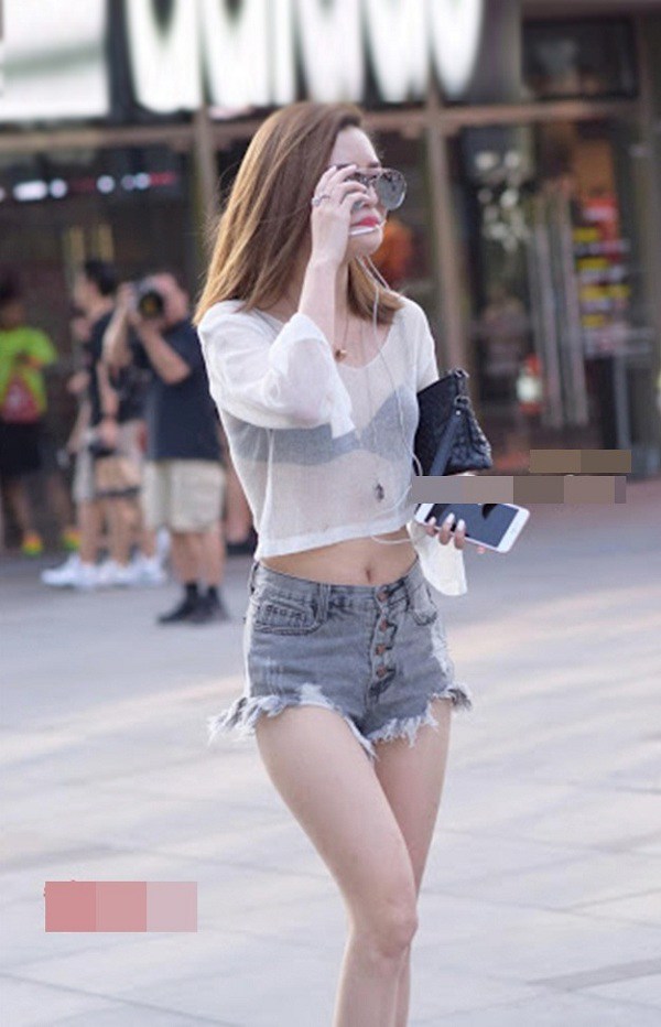 Wearing paper-thin see-through shirts, many women show off their panties in the middle of the street - 7