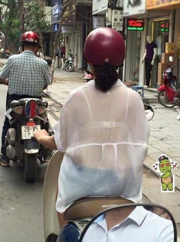Wearing paper-thin see-through shirts, many women show off their panties in the middle of the street - 4