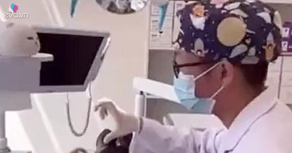 The dentist raised his hand to signal the assistant to take the instrument, the female patient had a sudden reaction