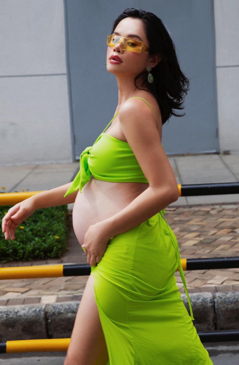 Tran Hien, Vbiz's newest pregnant woman, has a great taste in clothes showing off her big and round belly - 3