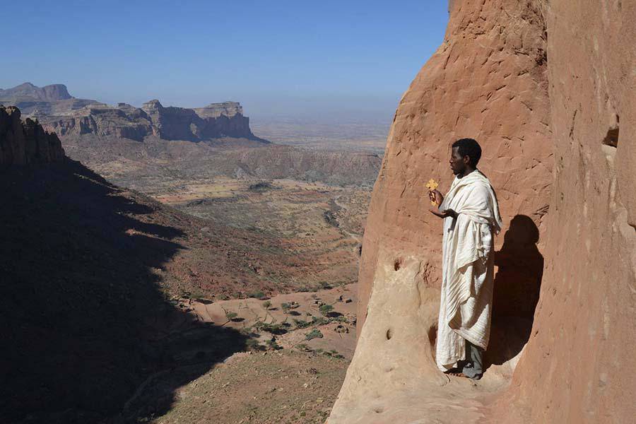 The church in Africa is located in a very dangerous place, tourists climb unprotected - 5