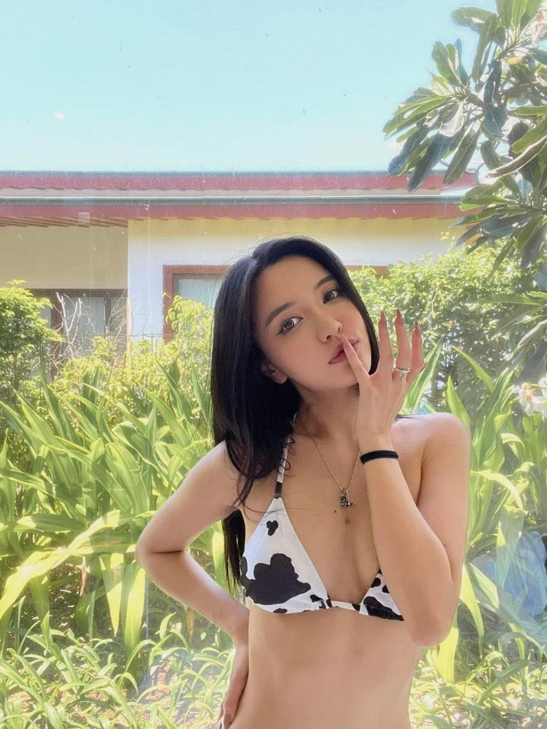 Bich Phuong wears a two-piece bikini, making a 
