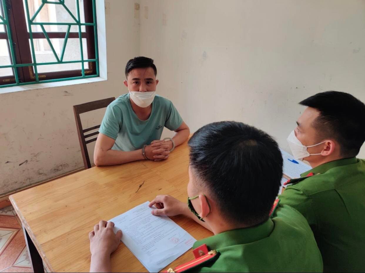 Trương Văn Minh tại trụ sở công an.