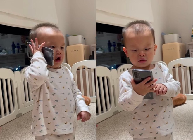 Leon tỏ thái độ căng thẳng khi nói chuyện điện thoại với ba Kim Lý, vừa nói vừa nhìn vào màn hình.
