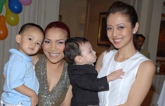 Rare photo of son Jennifer Pham Quang Dung being held by his mother at his 1st birthday: So cute!  - first