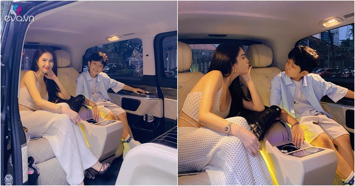 Son Ngoc Trinh Vu Khac Tiep poses childishly with his mother in a luxury car