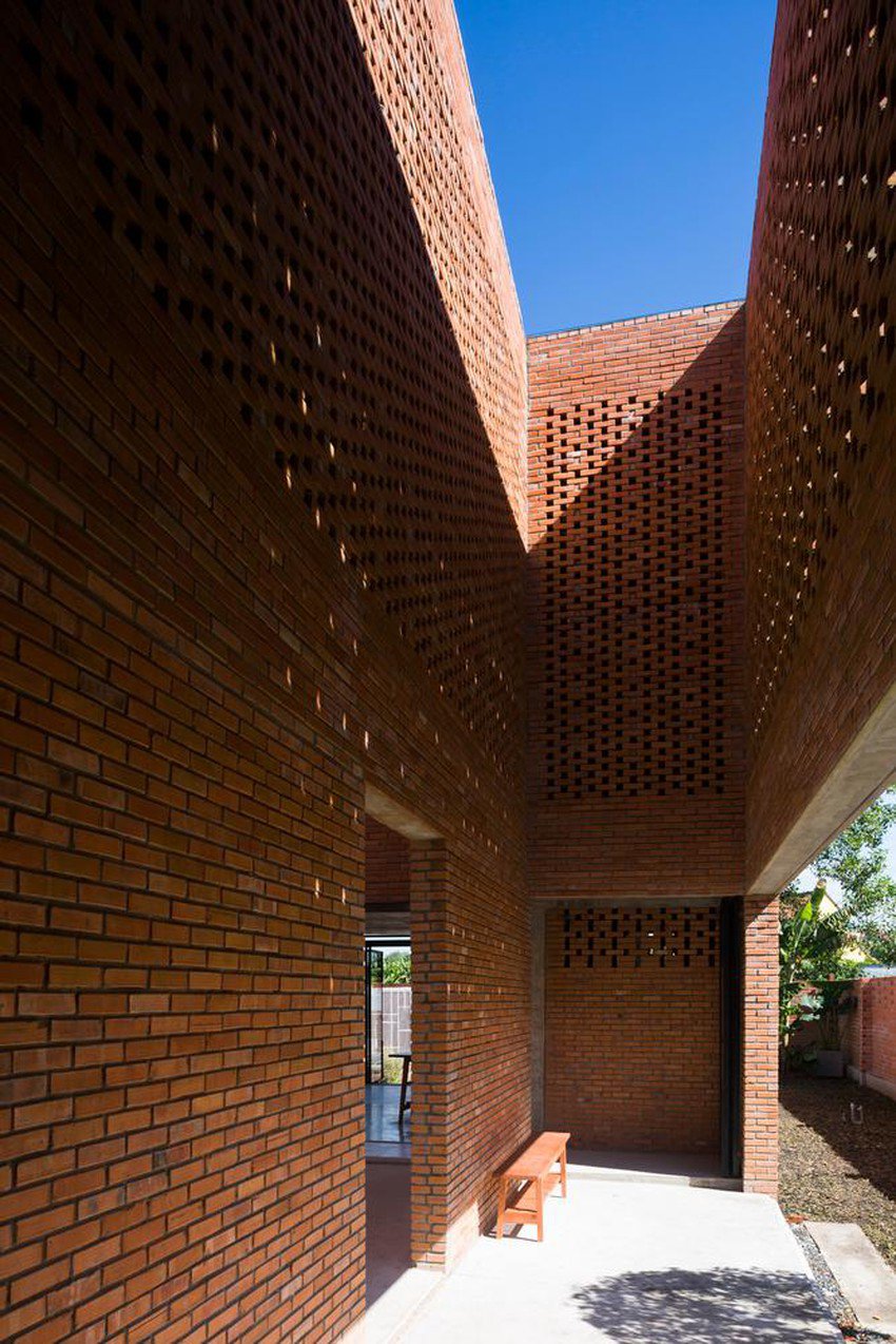 Simple but outstanding red brick house in Long An - 5