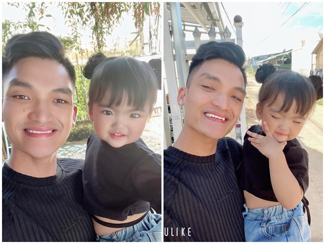  Minnie đã biết tạo dáng, tươi cười khi chụp ảnh cùng bố.
