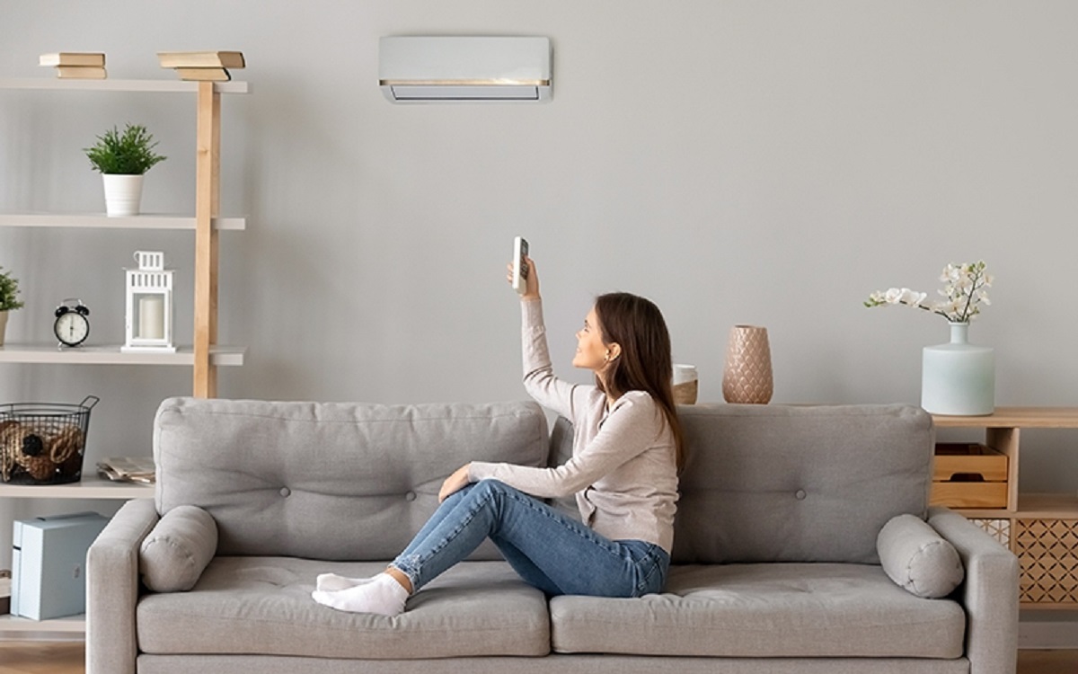 Woman relaxing in air conditioning