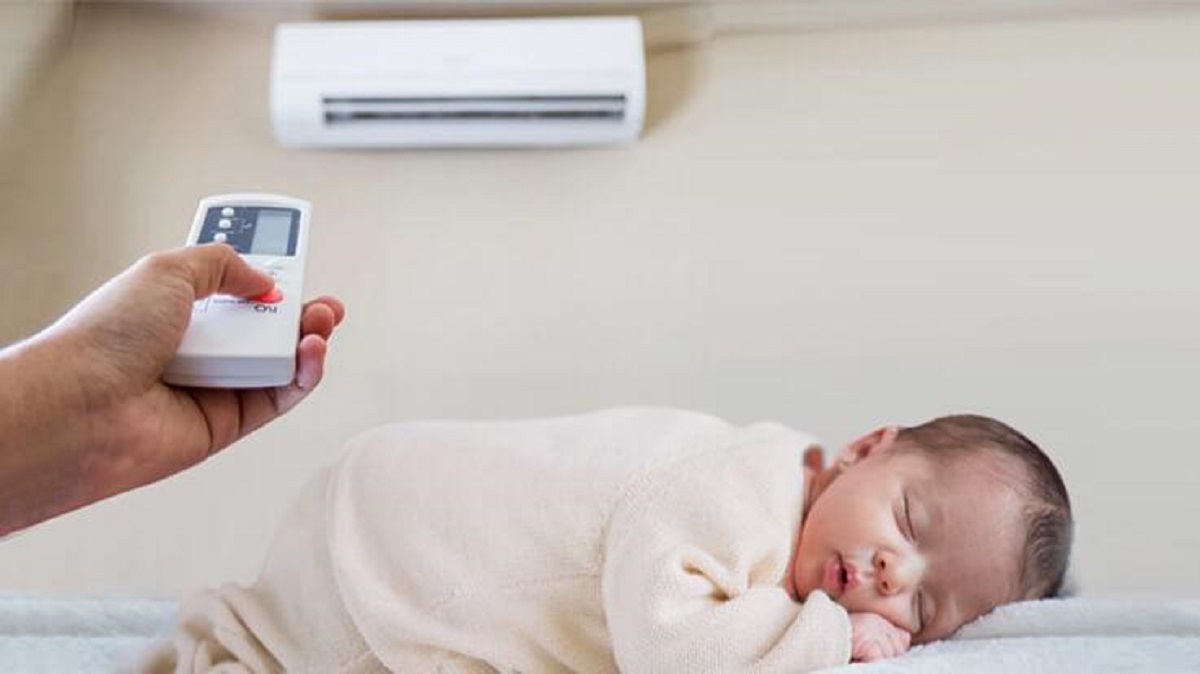 Family sleeping with air conditioning