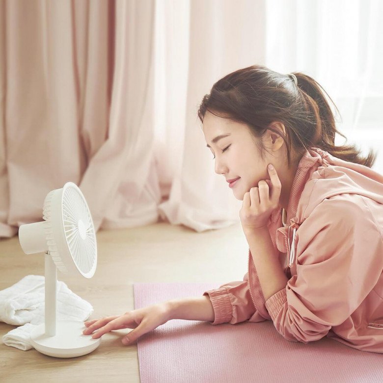 Image of a rechargeable fan with a warning sign