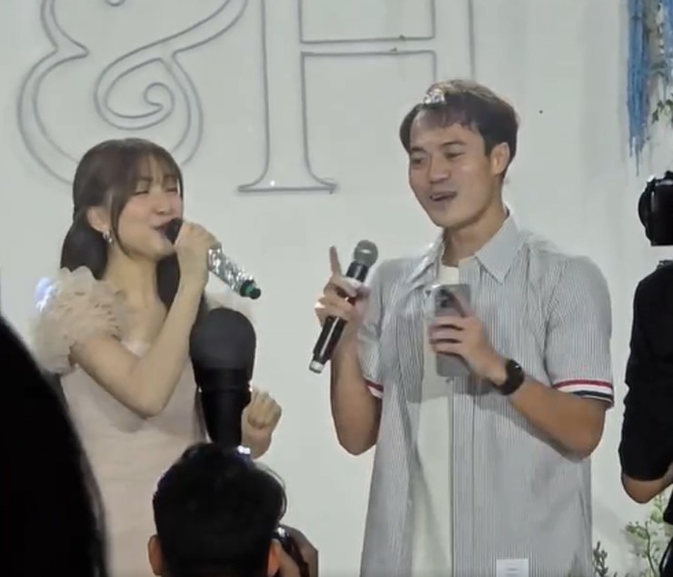 Hòa Minzy, Văn Toàn song ca Bật tình yêu lên trong tiệc cưới của Quang Hải tại khách sạn.