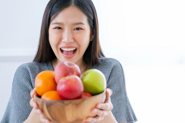 Ăn táo hợp lý có thể giúp phụ nữ giữ gìn vóc dáng đẹp. (Ảnh minh họa)