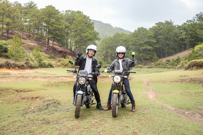 Huy and his mother posing at a beautiful location