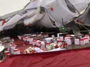 Tin tức - Kính thang máy vỡ, rạp cưới bị giật tung do dông lốc