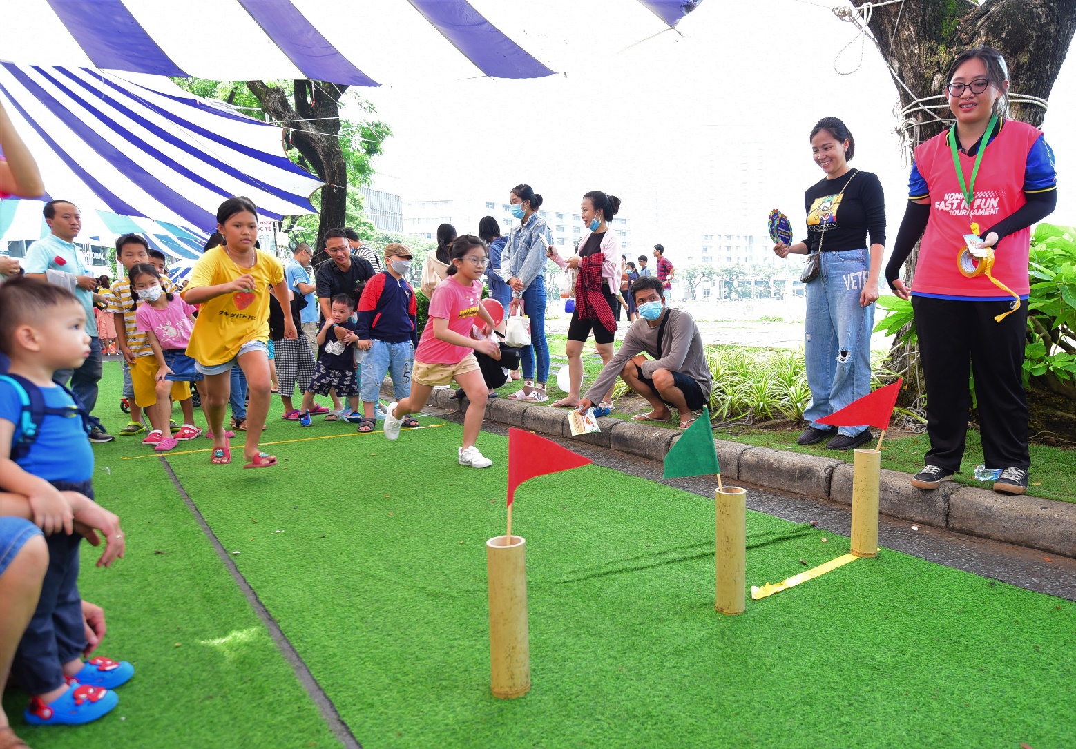 Children playing and enjoying themselves at an outdoor event