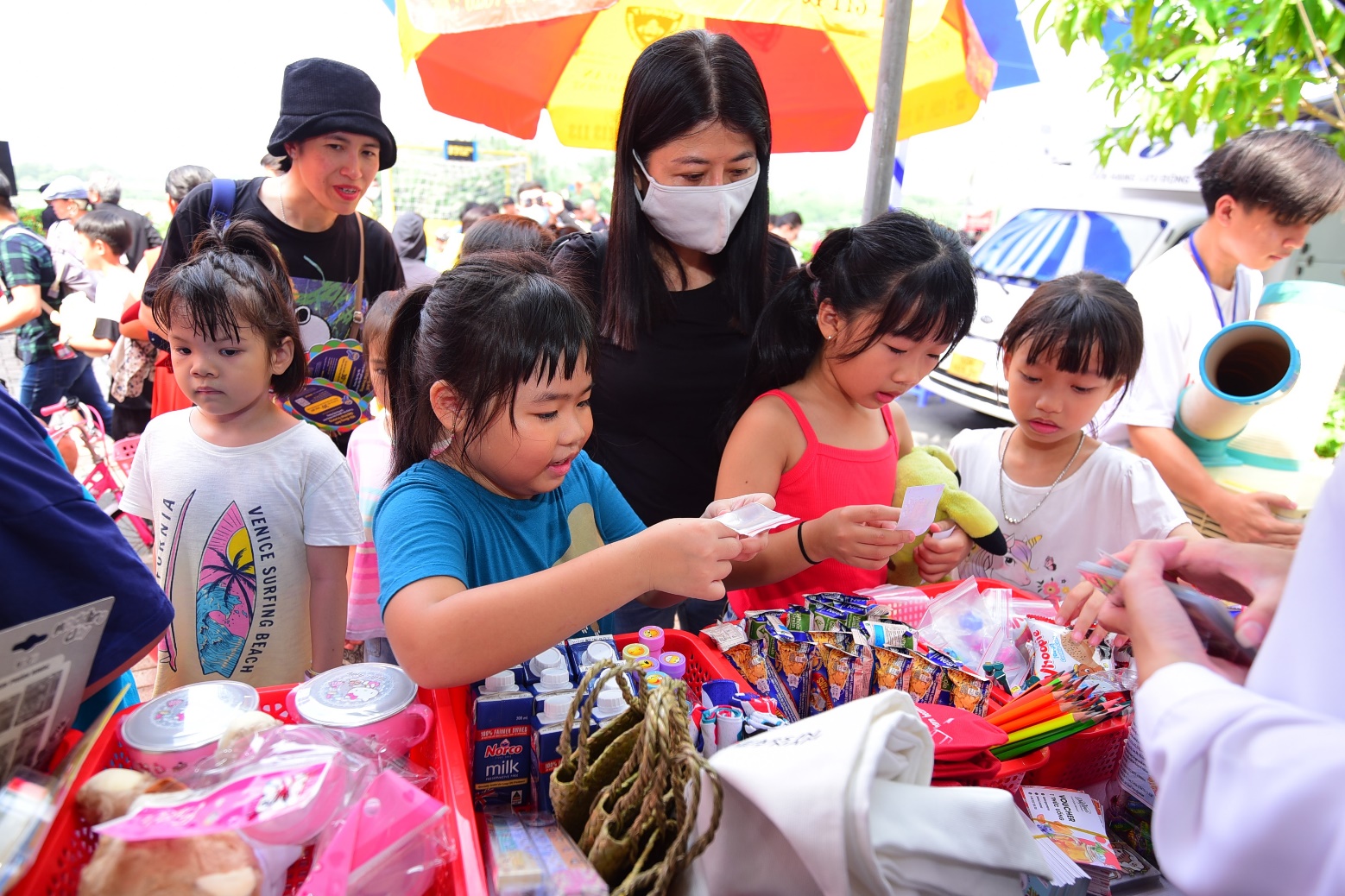 Children posing with their proud creations and achievements