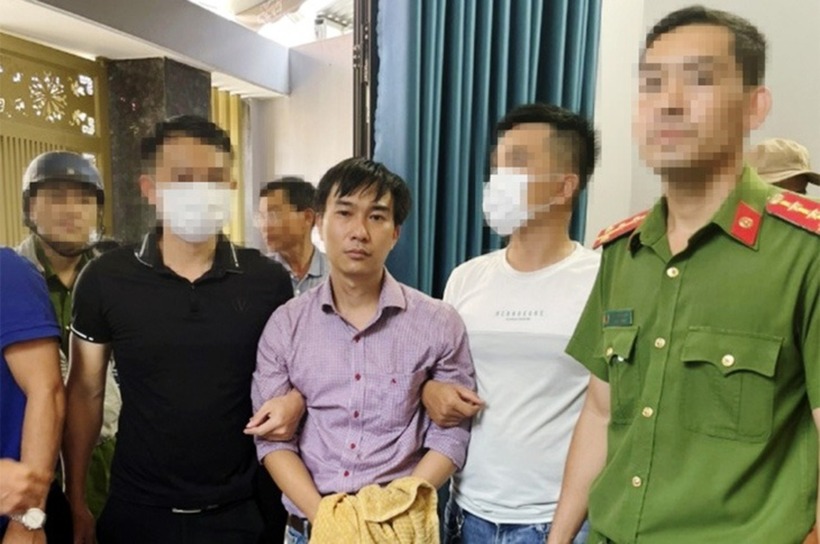 Bác sĩ Danh Sơn lúc bị bắt. Ảnh: Tuổi Trẻ