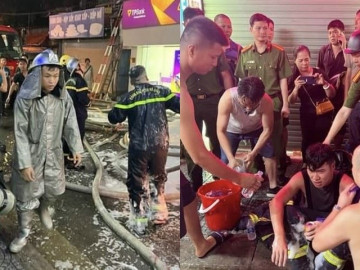 Hình ảnh người lính cứu hỏa nỗ lực chữa cháy ngôi nhà 6 tầng trên phố Định Công Hạ