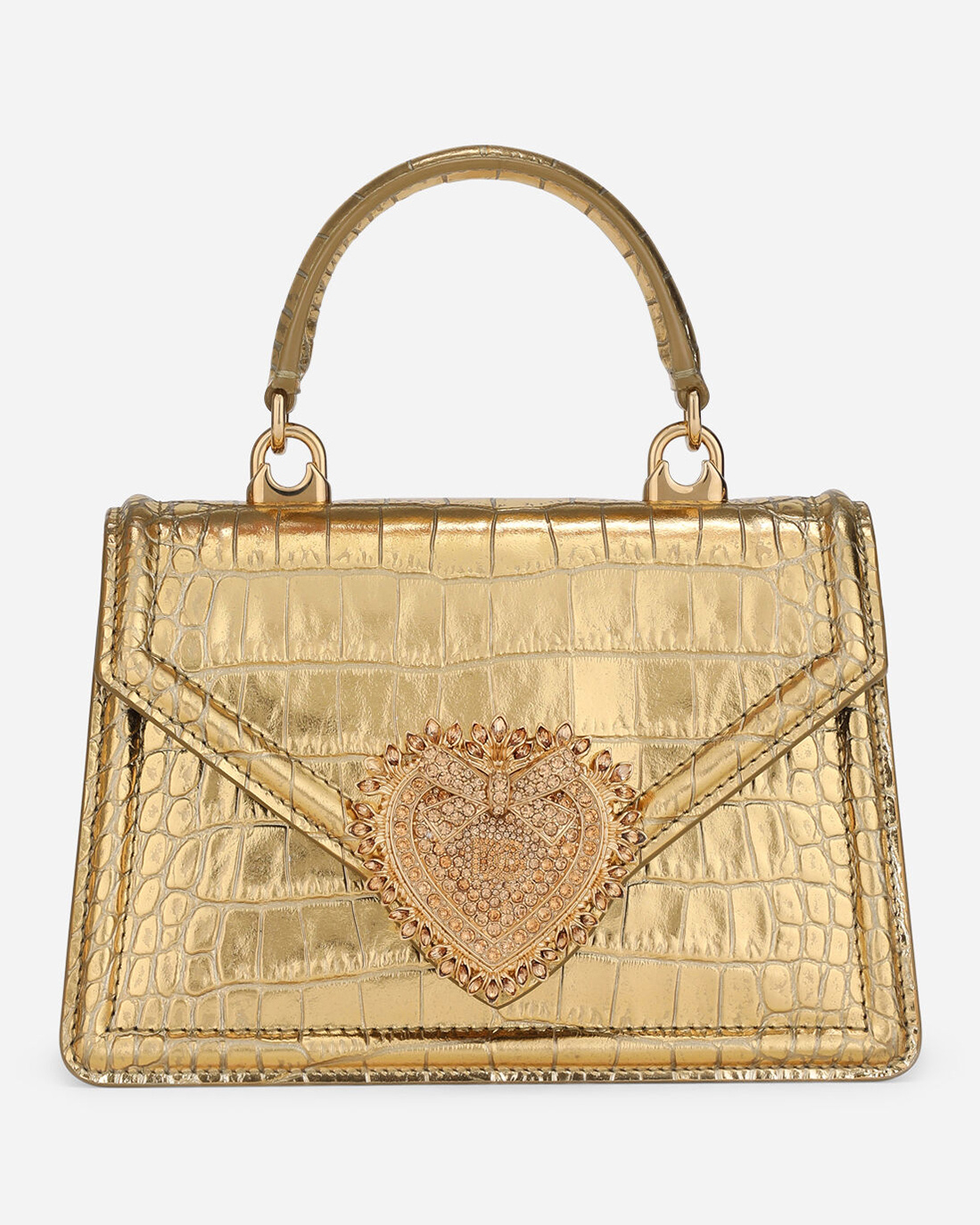 Đây là thiết kế Devotion cỡ nhỏ của nhà mốt danh tiếng Dolce amp; Gabbana, được dập họa tiết da cá sấu và đính pha lê, yết giá 2.695 USD (hơn 70 triệu đồng).