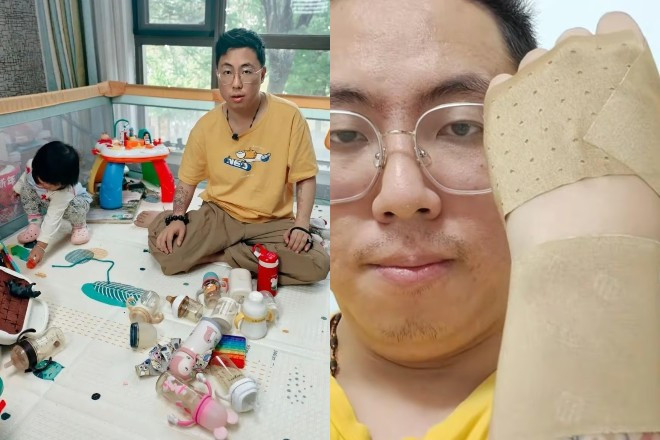 Người đàn ông thiếu ngủ, viêm khớp khi chăm con. Ảnh: SCMP