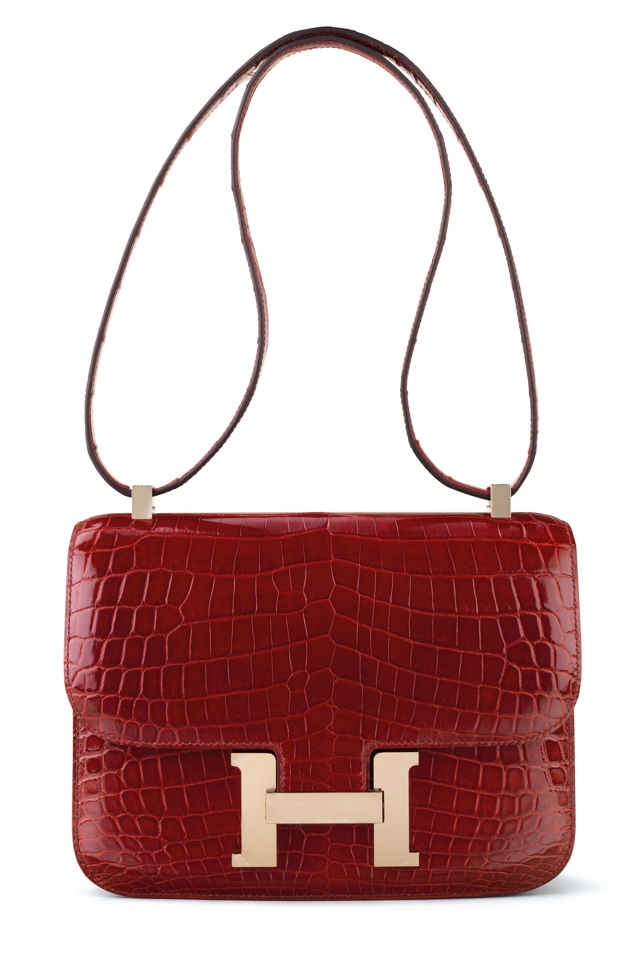 Chiếc túi Hermes Constance làm bằng da cá sấu màu đỏ rượu của mẹ Huyền My có mức giá lên đến gần 500 triệu đồng, là một trong những dòng túi cao cấp bậc nhất của nhà mốt nước Pháp.
