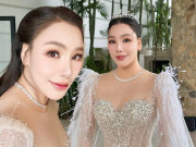 Cô dâu U50 Hồ Quỳnh Hương diện hai chiếc váy cưới lộng lẫy, e ấp xuất hiện bên chú rể