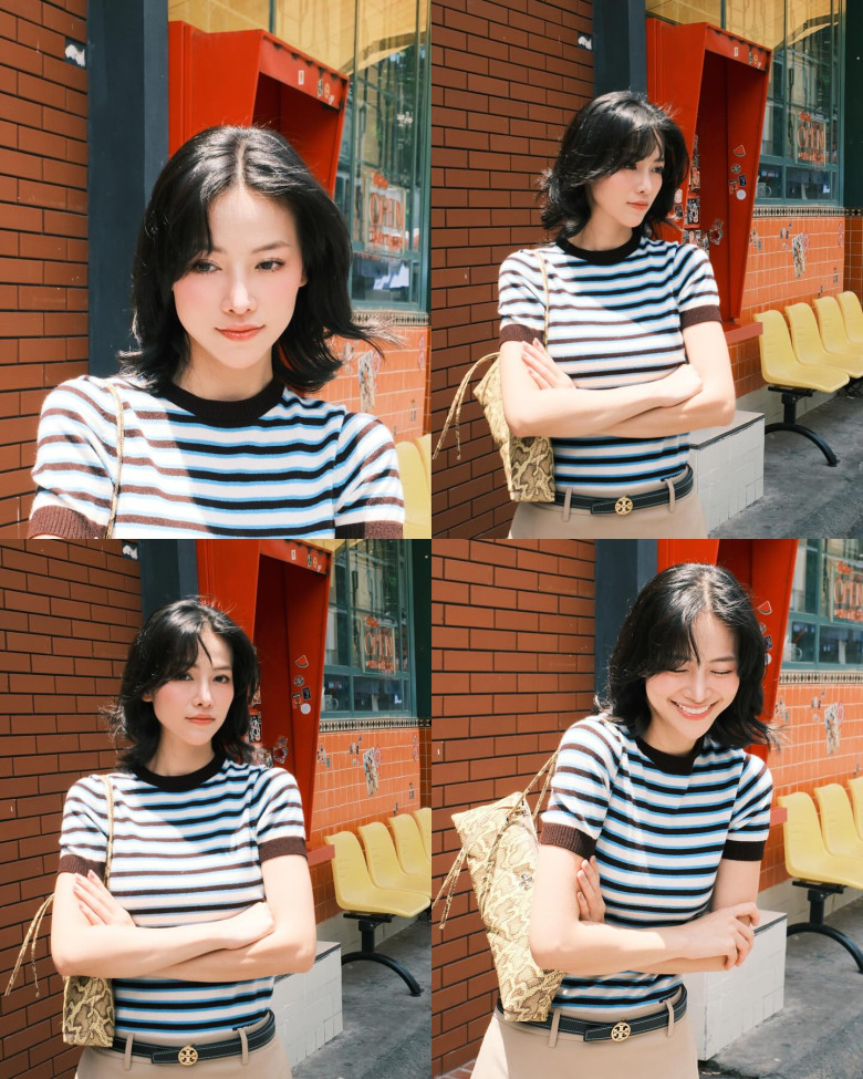 Hoa hậu Phương Khánh trông cổ điển với chiếc áo phông kẻ ngang.