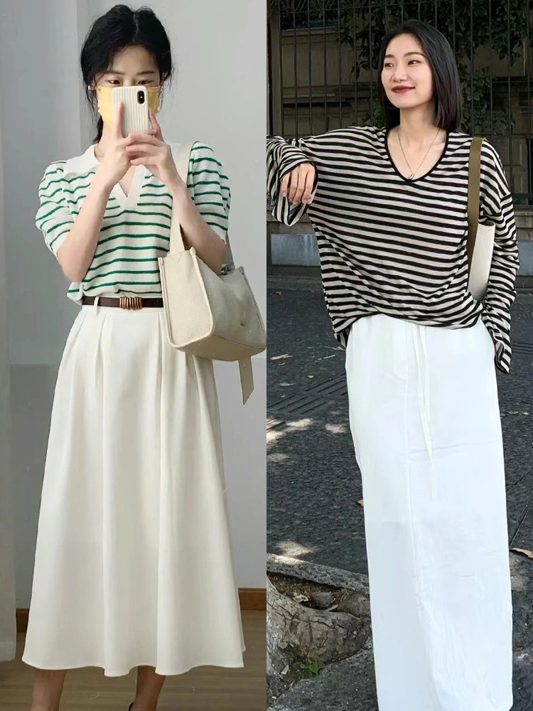 Chị em nhớ sơ vin áo để nâng cao eo và tạo cảm giác chân dài miên man ngay cả khi diện chân váy dài.
