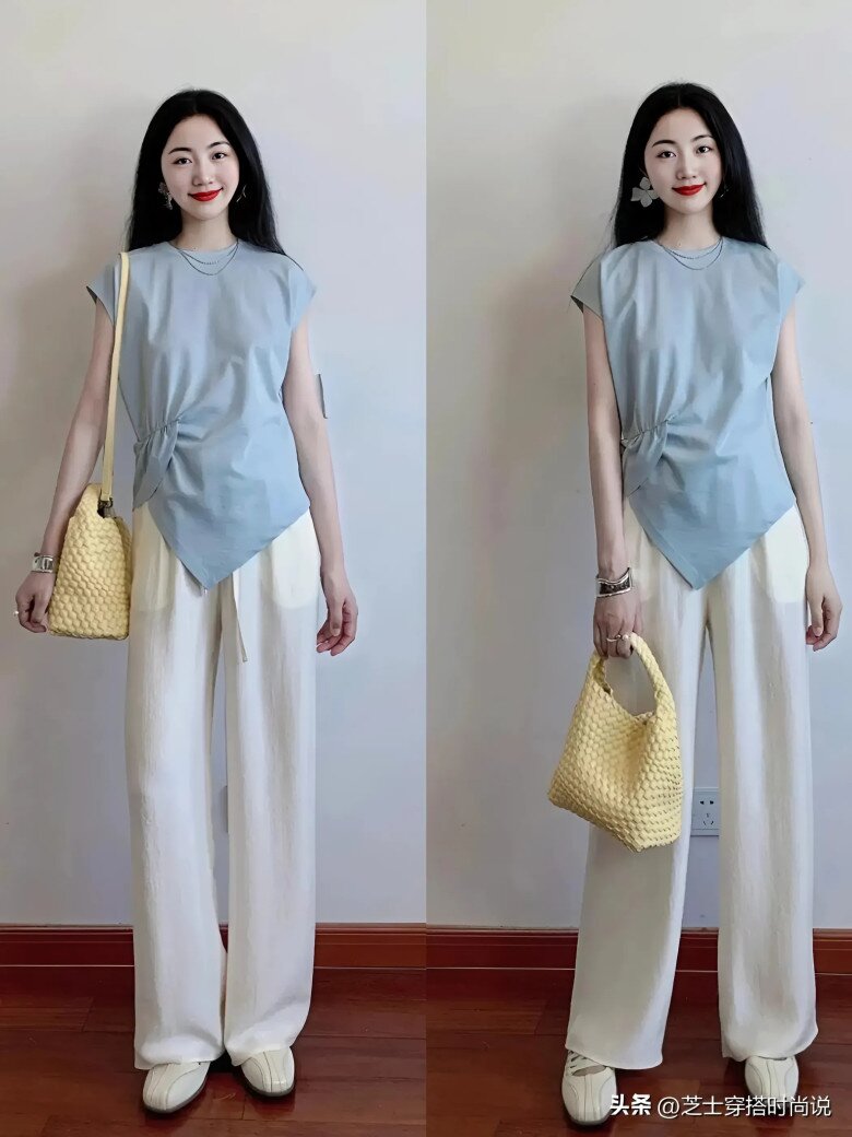 Chiếc áo phông cổ tròn màu xanh nhạt kết hợp với quần ống rộng màu trắng đục trông nhẹ nhàng, thoải mái nhưng vẫn rất quyến rũ.