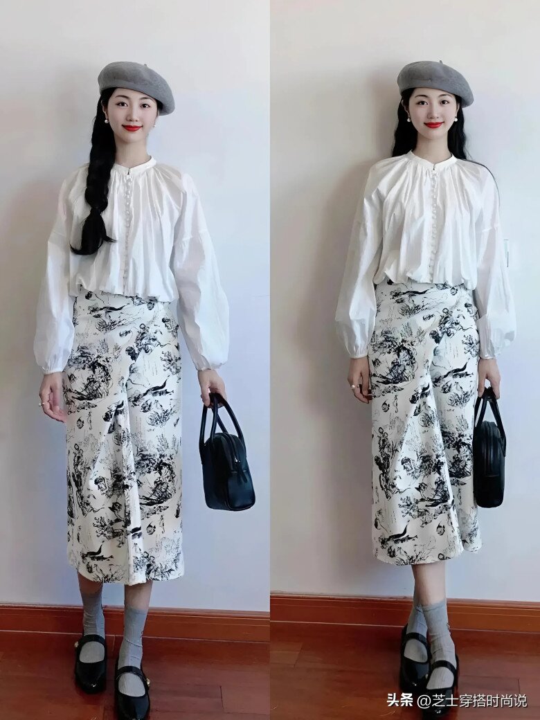 Chọn áo sơ mi trắng kết hợp với chân váy in họa tiết. Thiết kế theo phong cách tranh thủy mặc thể hiện gu thời trang mạnh mẽ. Mỗi chi tiết đều bộc lộ cảm quan nghệ thuật mạnh mẽ và hình dáng tổng thể mang đầy tính thiết kế.