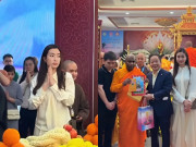 Giải trí - Hoa hậu Đỗ Mỹ Linh tháp tùng Bầu Hiển đi chiêm bái xá lợi Phật, khí chất chuẩn dâu hào môn