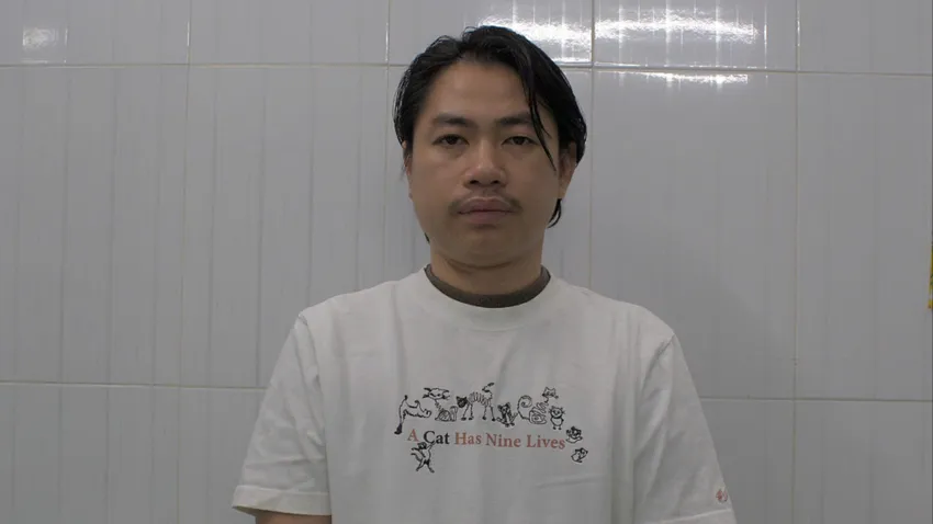 Hoàng tại cơ quan điều tra. Ảnh: CA