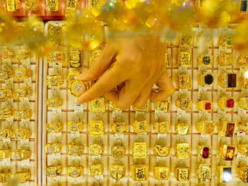 Giá bạc tăng mạnh hơn vàng