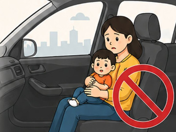 Ôm con ngồi ghế phụ cũng có thể bị phạt