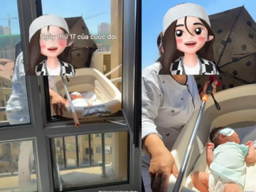 Yêu con - Mẹ mang con ra ngoài cửa sổ tầng cao để "phơi nắng trị vàng da", dân mạng nhìn hoảng hốt vì quá nguy hiểm