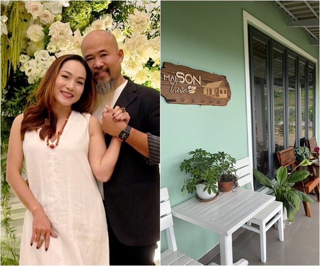 Một góc hiên nhà bình yên mang đậm phong cách mộc mạc với mảng tường sơn màu xanh mint nhẹ nhàng, đồng điệu cùng hệ cửa kính khung xám đen hiện đại. Bảng hiệu gỗ khắc chữ tinh tế cùng những chậu cây cảnh như kim ngân, vạn lộc tạo điểm nhấn xanh mát, chào đón bất cứ ai ghé thăm.