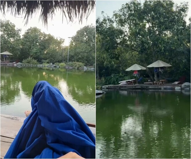 Tầm nhìn khoáng đạt hướng ra mặt hồ tĩnh lặng, nơi lắp đặt những tán ô che nắng dọc theo cầu gỗ. Không gian này được thiết kế tối giản nhằm giúp mọi người tận hưởng trọn vẹn làn gió mát lành từ vùng sông nước.