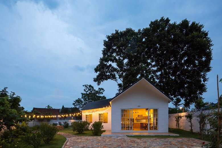 House illuminated at night with LED string lights
