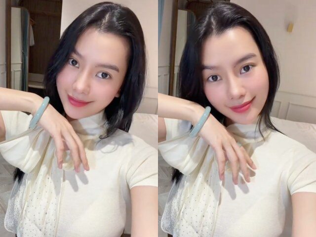 Á hậu Hoàng Nhung khoe chiếc nhẫn bản lớn và vòng ngọc phỉ thúy.
