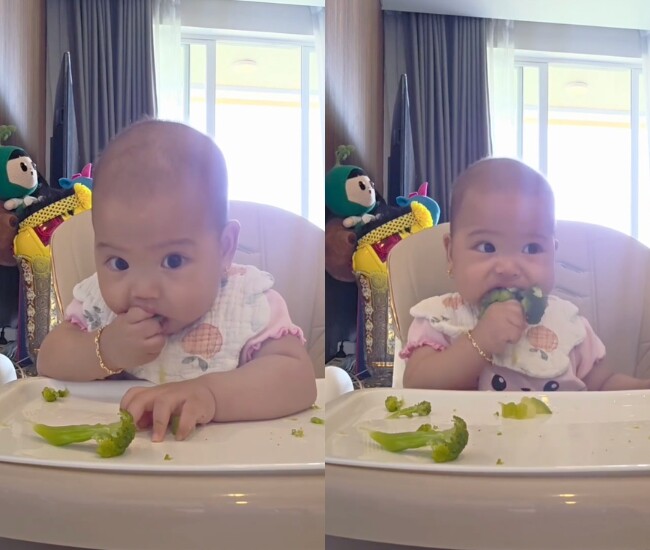 Bé Harley thích thú mukbang mà không cần đến sự trợ giúp từ mẹ. 