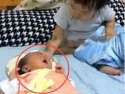 Yêu con - Người mẹ tỉnh giấc vì tiếng con khóc giữa đêm, vừa bật đèn thấy con gái có hành động khó tin với em sơ sinh