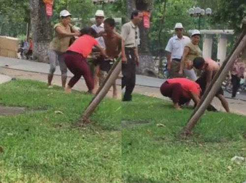 Bị chồng đánh tối tăm mặt mũi giữa phố, vợ quáng quàng bóp amp;#34;của quýamp;#34; chồng để chạy thoát - 2