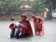 Tin tức - Áp thấp nhiệt đới đổ bộ đất liền, Hà Nội mưa lớn giờ tan tầm, nguy cơ ngập nhiều phố