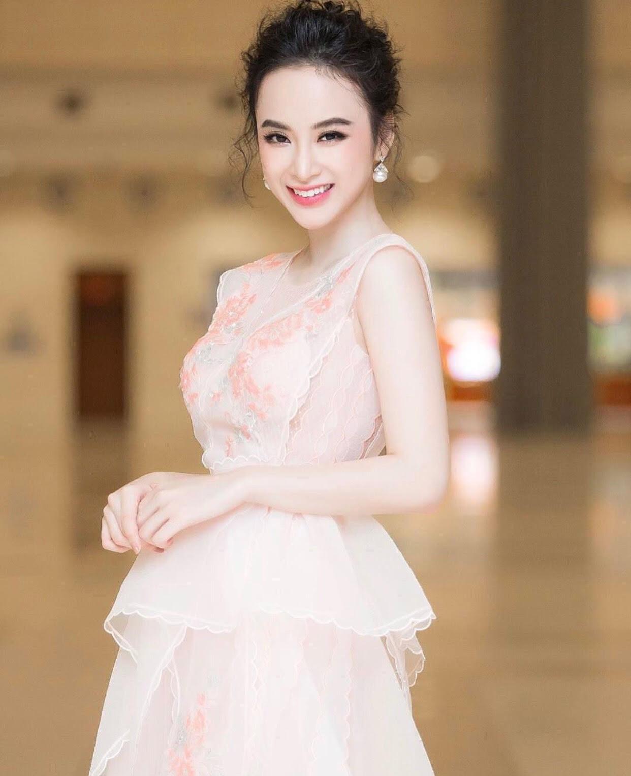 Những kiểu tóc búi vừa đẹp, vừa mát rượi giúp Angela Phương Trinh ghi điểm! - 12