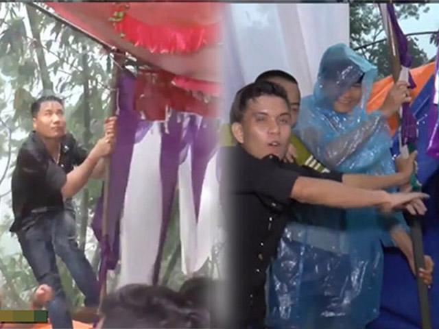 Tổ chức đám cưới đúng lúc bão về, các thanh niên gồng mình giữ rạp dưới mưa