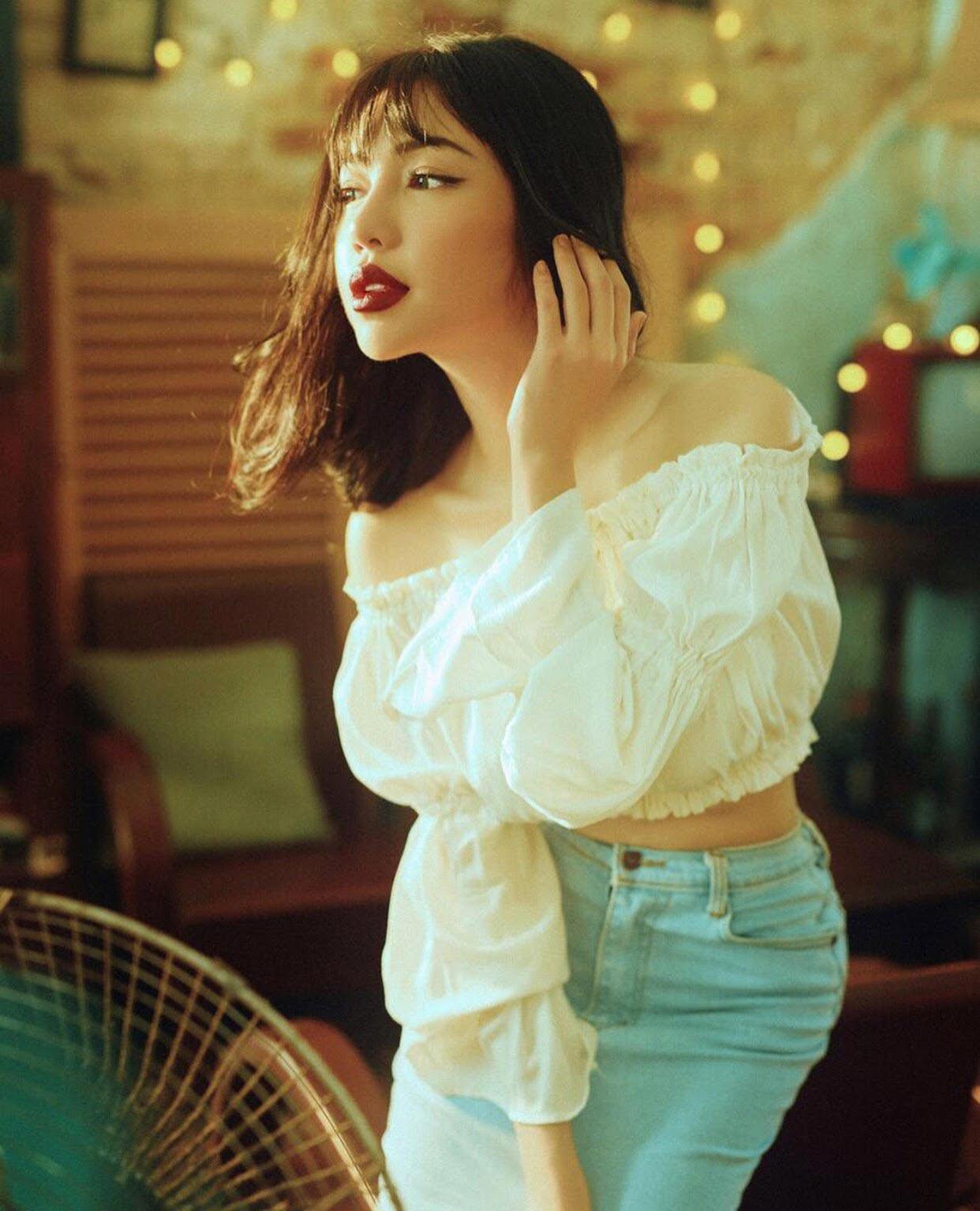 Có gì đặc biệt ở chiếc áo amp;#34;mãi không hết mốtamp;#34; được sao Việt diện suốt cả mùa hè? - 1